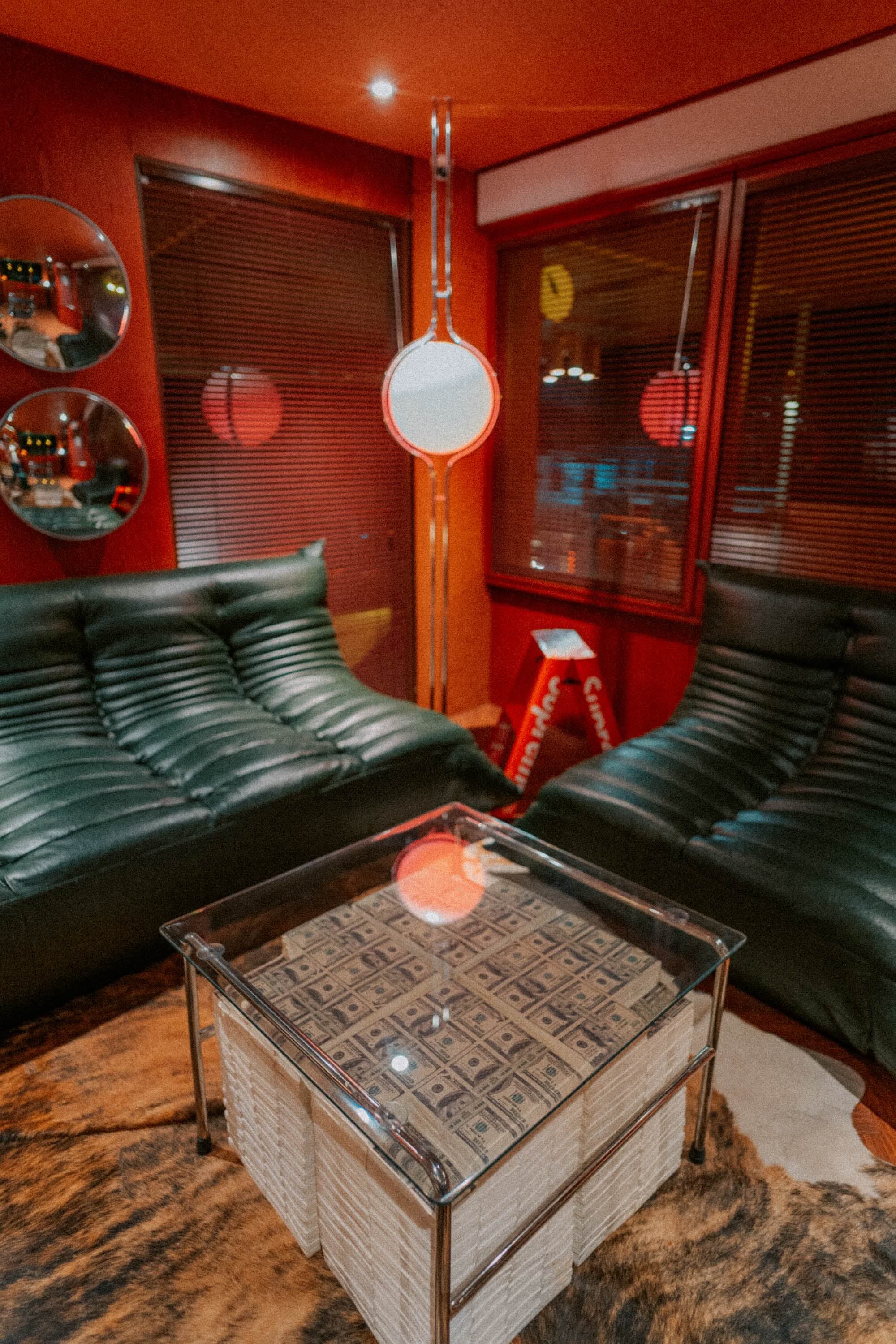 Leather sofas and a glass table in the lounge