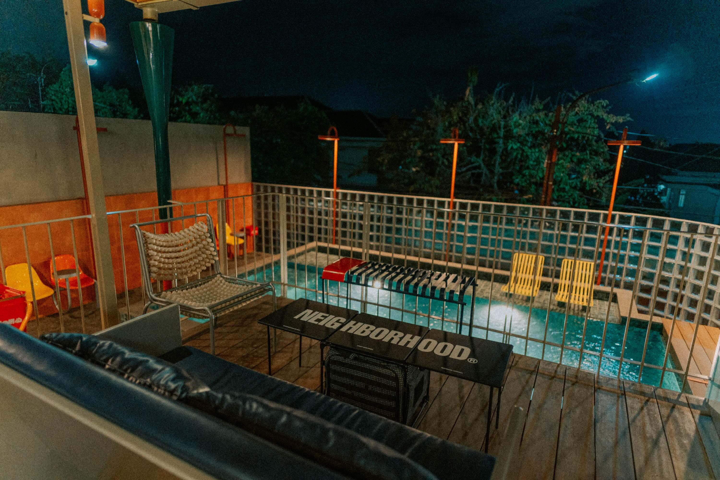 Poolside sofa at night
