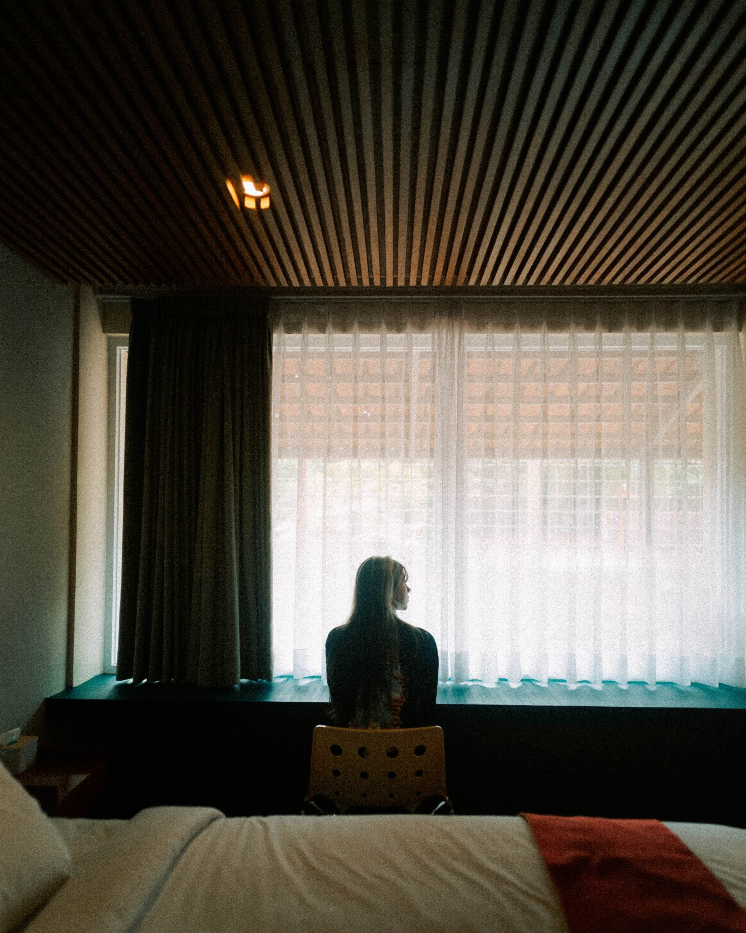 A guest by the room window