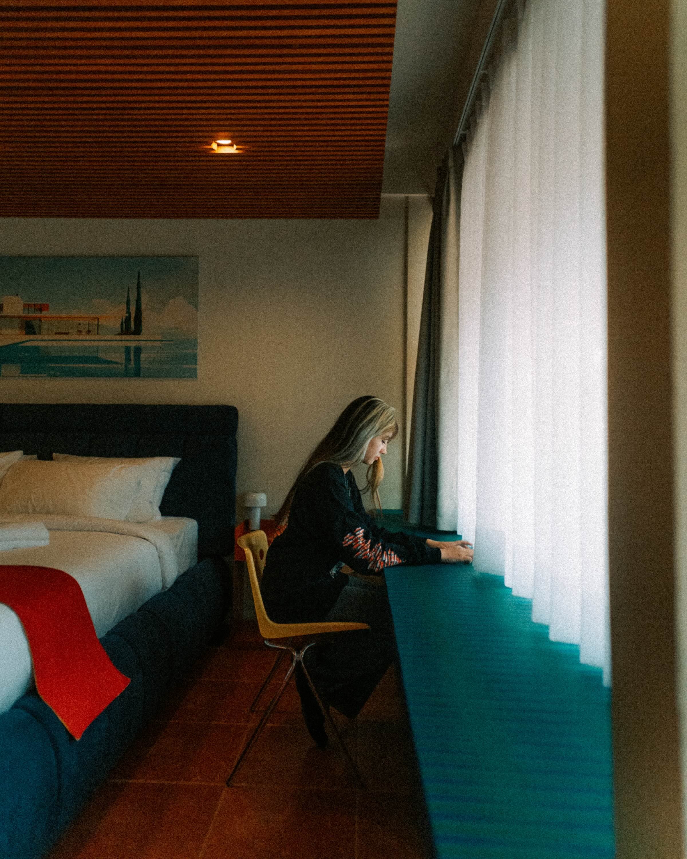 A desk by the room window