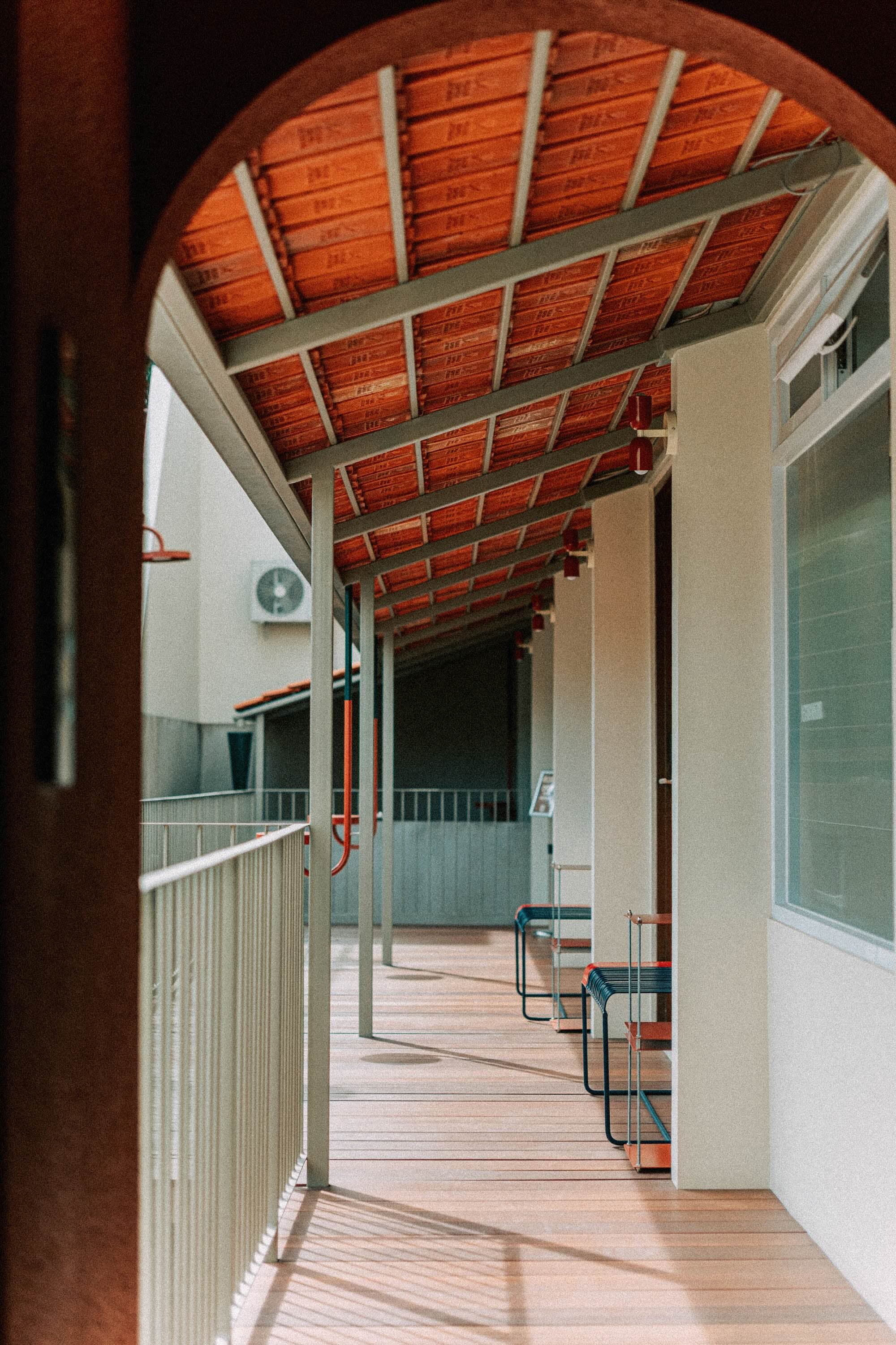An open walkway with a wooden floor